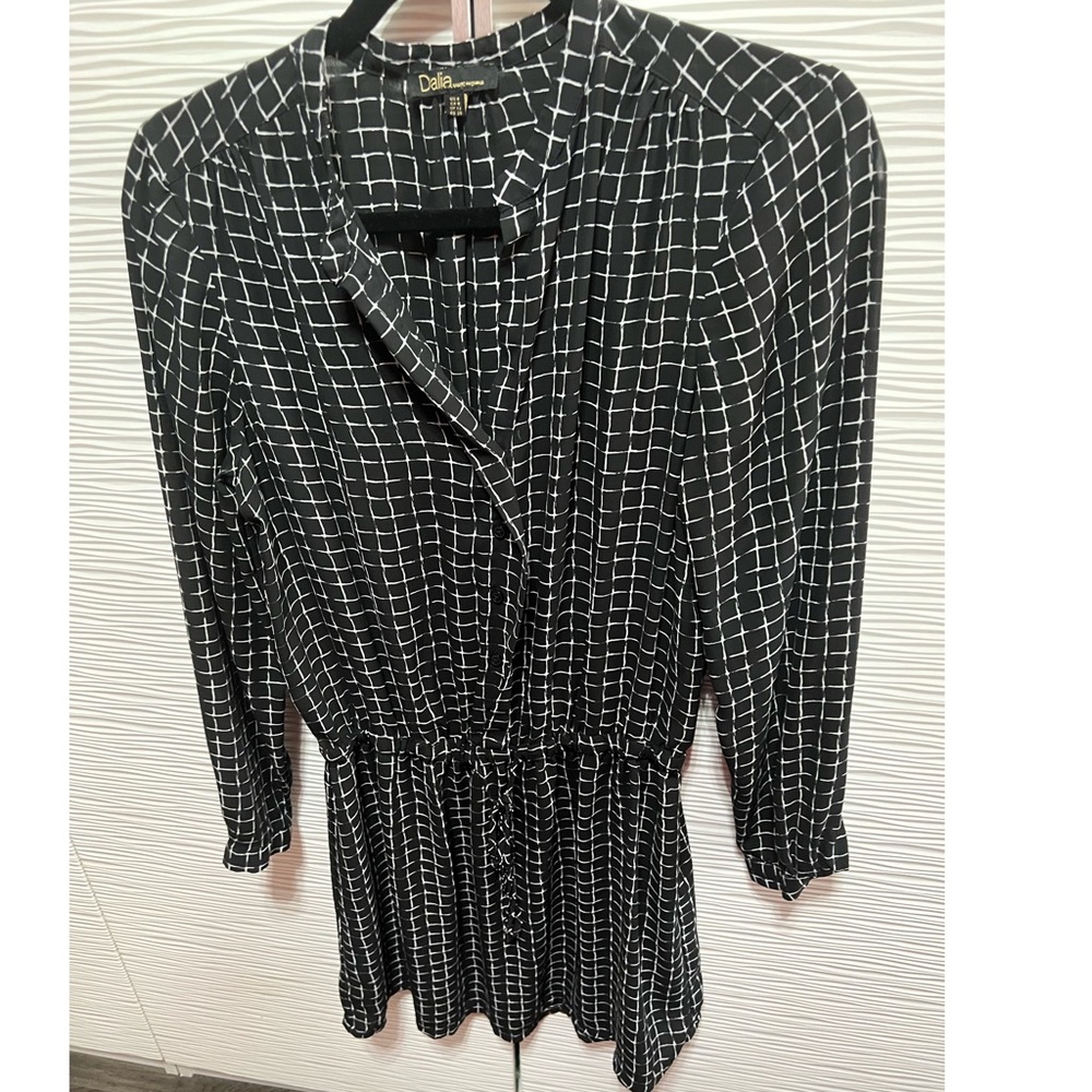 Black and white cinched waist mini dress